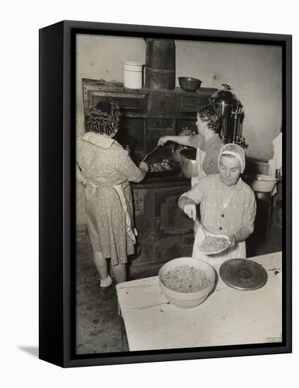 Women Cooking Spaghetti and Frying Chicken on an Old Stove for the Grape Festival-null-Framed Stretched Canvas