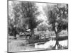 Women Crossing Bridge-null-Mounted Photographic Print