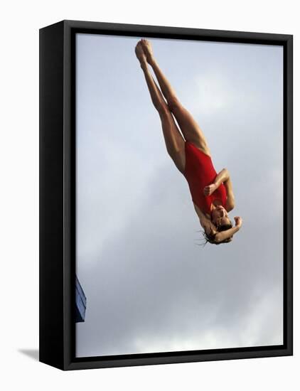 Women Diver Flying Through the Air, California, USA-Paul Sutton-Framed Stretched Canvas