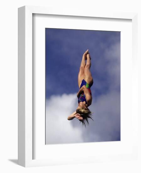 Women Diver Flying Through the Air, California, USA-Paul Sutton-Framed Photographic Print