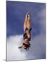 Women Diver Flying Through the Air, California, USA-Paul Sutton-Mounted Photographic Print