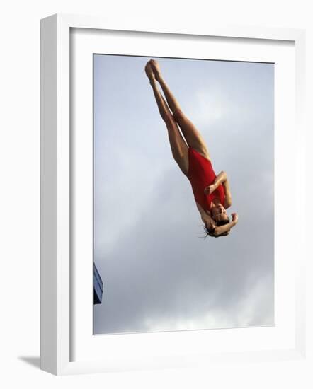 Women Diver Flying Through the Air, California, USA-Paul Sutton-Framed Photographic Print