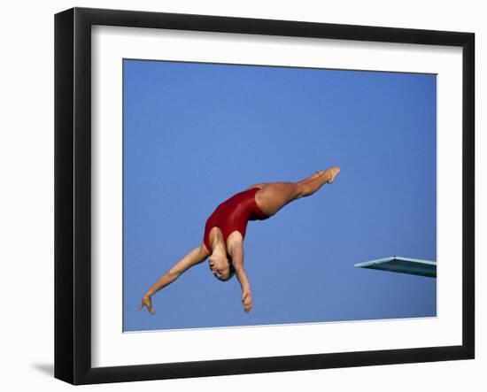 Women Diver Flying Through the Air-null-Framed Premium Photographic Print