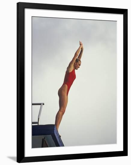 Women Diver Preparing to Jump Off the Platform, California, USA-Paul Sutton-Framed Photographic Print