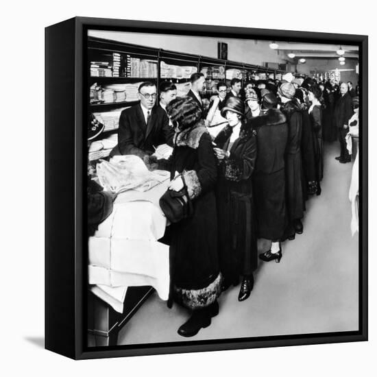 Women Eagerly Shop across the Counter at a Newly Opened Sears Retail Store-null-Framed Stretched Canvas