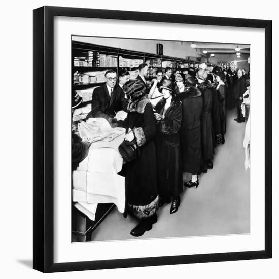 Women Eagerly Shop across the Counter at a Newly Opened Sears Retail Store-null-Framed Photo