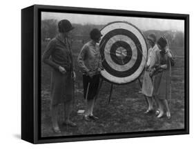 Women examining Archery Target Photograph - Washington, DC-Lantern Press-Framed Stretched Canvas