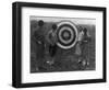 Women examining Archery Target Photograph - Washington, DC-Lantern Press-Framed Art Print