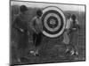 Women examining Archery Target Photograph - Washington, DC-Lantern Press-Mounted Art Print