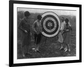 Women examining Archery Target Photograph - Washington, DC-Lantern Press-Framed Art Print