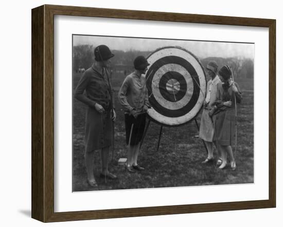 Women examining Archery Target Photograph - Washington, DC-Lantern Press-Framed Art Print
