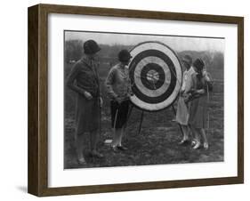 Women examining Archery Target Photograph - Washington, DC-Lantern Press-Framed Art Print