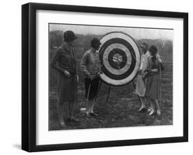 Women examining Archery Target Photograph - Washington, DC-Lantern Press-Framed Art Print