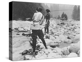 Women fly fishing at Mount Rainier National Park Photograph - Seattle, WA-Lantern Press-Stretched Canvas