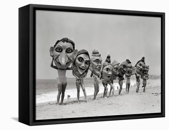 Women Holding Giant Masks-Bettmann-Framed Stretched Canvas