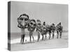 Women Holding Giant Masks-Bettmann-Stretched Canvas