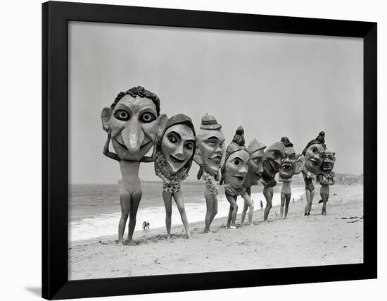 Women Holding Giant Masks-Bettmann-Framed Premium Photographic Print