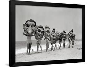 Women Holding Giant Masks-Bettmann-Framed Premium Photographic Print