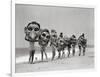 Women Holding Giant Masks-Bettmann-Framed Photographic Print