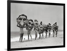 Women Holding Giant Masks-Bettmann-Framed Photographic Print