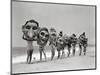 Women Holding Giant Masks-Bettmann-Mounted Photographic Print