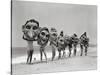 Women Holding Giant Masks-Bettmann-Stretched Canvas