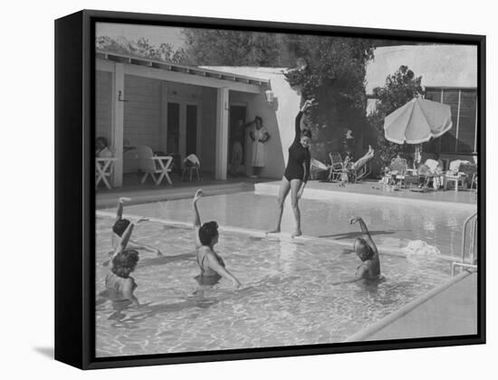 Women in Tank Suits Pool Excercising at Elizabeth Arden's Reducing Resort in Arizona-null-Framed Stretched Canvas