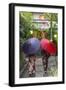 Women in traditional dress with umbrellas walking through Kyoto, Japan-Peter Adams-Framed Photographic Print