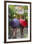 Women in traditional dress with umbrellas walking through Kyoto, Japan-Peter Adams-Framed Photographic Print