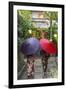 Women in traditional dress with umbrellas walking through Kyoto, Japan-Peter Adams-Framed Photographic Print