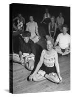 Women Meditating During their Exercises-Loomis Dean-Stretched Canvas