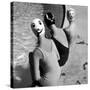 Women Modeling Bathing Caps with Faces on Them-Ralph Crane-Stretched Canvas