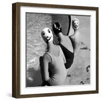 Women Modeling Bathing Caps with Faces on Them-Ralph Crane-Framed Photographic Print