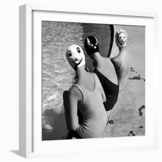 Women Modeling Bathing Caps with Faces on Them-Ralph Crane-Framed Photographic Print