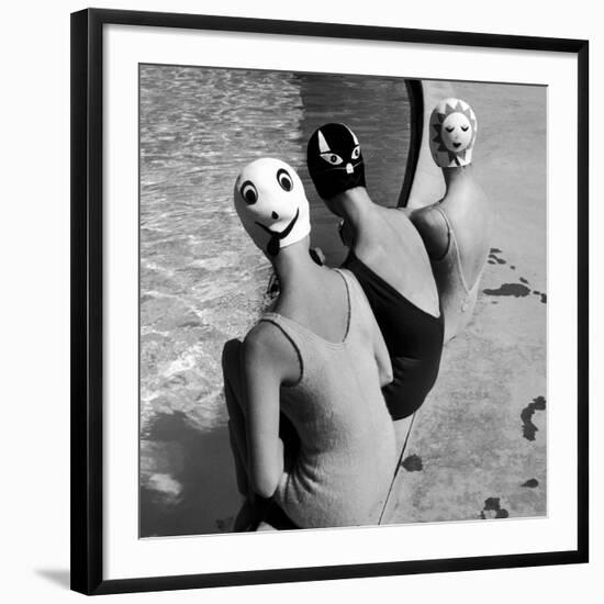 Women Modeling Bathing Caps with Faces on Them-Ralph Crane-Framed Photographic Print