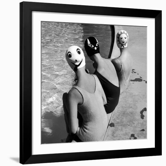 Women Modeling Bathing Caps with Faces on Them-Ralph Crane-Framed Photographic Print