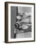 Women Modeling Bathing Caps with Faces on Them-Ralph Crane-Framed Photographic Print