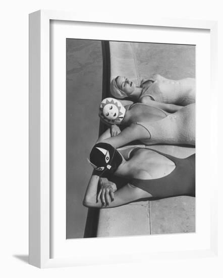 Women Modeling Bathing Caps with Faces on Them-Ralph Crane-Framed Photographic Print