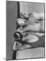 Women Modeling Bathing Caps with Faces on Them-Ralph Crane-Mounted Photographic Print