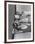 Women Modeling Bathing Caps with Faces on Them-Ralph Crane-Framed Photographic Print