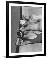 Women Modeling Bathing Caps with Faces on Them-Ralph Crane-Framed Photographic Print