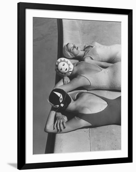 Women Modeling Bathing Caps with Faces on Them-Ralph Crane-Framed Photographic Print