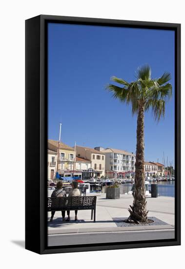 Women on a Bench Near a Palm Tree-Guy Thouvenin-Framed Stretched Canvas