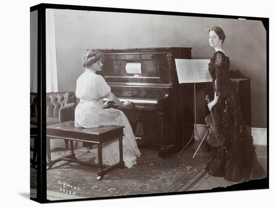 Women Playing a Player Piano and a Violin, New York, 1907-Byron Company-Stretched Canvas