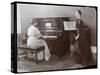 Women Playing a Player Piano and a Violin, New York, 1907-Byron Company-Stretched Canvas