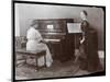 Women Playing a Player Piano and a Violin, New York, 1907-Byron Company-Mounted Giclee Print