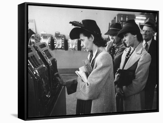 Women Playing Slot Machines at Las Vegas Club-Peter Stackpole-Framed Stretched Canvas
