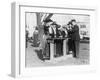 Women Police Officers Inspect Guns Photograph-Lantern Press-Framed Art Print