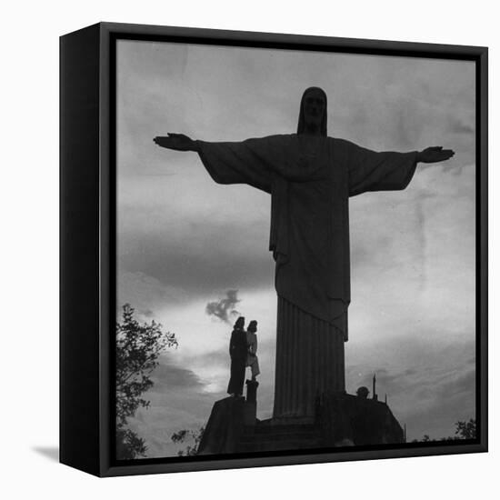 Women Posing with the Statue Called "Christ the Redeemer"-Hart Preston-Framed Stretched Canvas