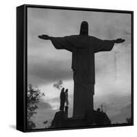 Women Posing with the Statue Called "Christ the Redeemer"-Hart Preston-Framed Stretched Canvas